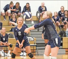  ?? Scott Herpst ?? Reece Roberts bumps a ball during a recent match as teammate Lexi Foster looks on. Gordon Lee is the No. 3 seed for this week’s NGAC Tournament after being named tri-champions of the regular season, along with Heritage and Lakeview. All three teams finished 8-1 in league play.