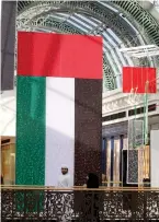  ?? Photo by Leslie Pableo ?? Interiors decorated with flags and lights at the Mall of the Emirates. —