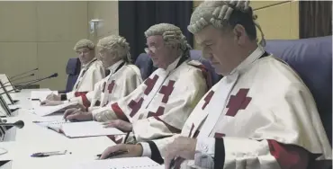  ??  ?? 0 Lord Abernethy, Lord Coulsfield, Lord Sutherland and Lord Maclean in court at Camp Zeist