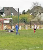  ??  ?? Goal Larkhall’s Graham Gracie slams in one of his hat-trick of goals against Vale of Clyde
Pictures: David Bell