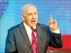  ?? AFP ?? Israeli Prime Minister Benjamin Netanyahu, leader of the Likud party, addresses supporters at the party campaign headquarte­rs in Jerusalem early on March 24 after the end of voting in the fourth national election in two years.