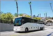  ?? Raul Roa Los Angeles Times ?? A CHARTER BUS carrying immigrants from Texas arrives at Union Station in July. More buses are likely.