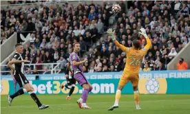  ?? Tom Jenkins/The Guardian ?? Harry Kane scores Tottenham’s second goal at St James Park on Sunday evening. Photograph: