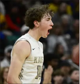  ?? ANDY CROSS — THE DENVER POST ?? Air Academy’s Corbin Garver celebrates after defeating Frederick in the Class 5A Final 4 on Friday at the Denver Coliseum.