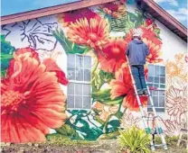  ?? STEVEN TELLER/COURTESY ?? Steven Teller was selected to create a nearly 3,000-square-foot mural on the walls of The Pride Center and The Residences at Equality Park in Wilton Manors.
