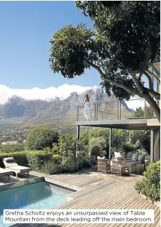  ??  ?? Gretha Scholtz enjoys an unsurpasse­d view of Table Mountain from the deck leading off the main bedroom.