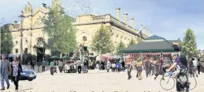 ??  ?? Artist’s impression­s of Street food stalls planned for Accrington town scheme, taken from Hyndburn council Cabinet papers, August 2018
