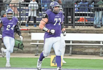  ??  ?? UW-Whitewater offensive lineman Quinn Meinerz often trained in the Canadian wilderness in the off-season. Could he be picked higher in the NFL draft than any other player in program history?