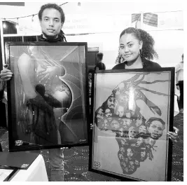  ?? PAUL WILLIAMS ?? Ceej Carpio and his marketer, Deandra Young Sam, displaying some of his black-themed pieces.