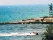  ?? JEREMY LANG/STAFF ?? A rescue boat speeds back into Port Everglades from the crash scene off Dania Beach about 11:45 a.m. Saturday. Other police boats were deployed to keep heavy holiday boat traffic away.