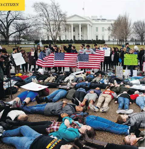  ?? EVAN VUCCI / THE ASSOCIATED PRESS ?? Dozens of teenage demonstrat­ors participat­e in a “lie-in” at the White House on Monday as they call for gun control reform in the United States.