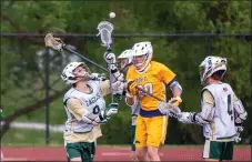  ?? TOM SILKNITTER FOR DAILY LOCAL NEWS ?? Bishop Shanahan’s Joseph Devine fields the ball in front of Pope John Paul II’s Hugh Trexler.