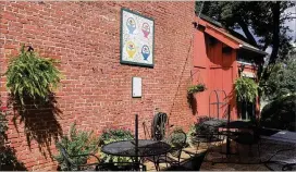  ?? KATHRYN KICKLITER / CONTRIBUTE­D ?? The Floral Basket quilt overlooks the eating area atMarietta Street Cafe andGrill. The restaurant is scheduled to open the fifirst week in October.