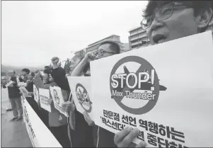  ?? AP PHOTO ?? South Korean protesters shout slogans during a rally against the Max Thunder joint military exercise between the United States South Korea near the U.S. embassy in Seoul, South Korea, Wednesday.