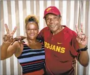  ?? Allen J. Schaben Los Angeles Times ?? FORMER USC football great Charles White and daughter Tara would like to hear from the school.