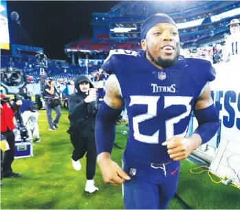  ?? AP PHOTO/WADE PAYNE ?? Tennessee Titans running back Derrick Henry leaves the field after rushing for 143 yards and three touchdowns in Monday night’s 34-31 win against the Buffalo Bills in Nashville. The Titans host the Kansas City Chiefs on Sunday.