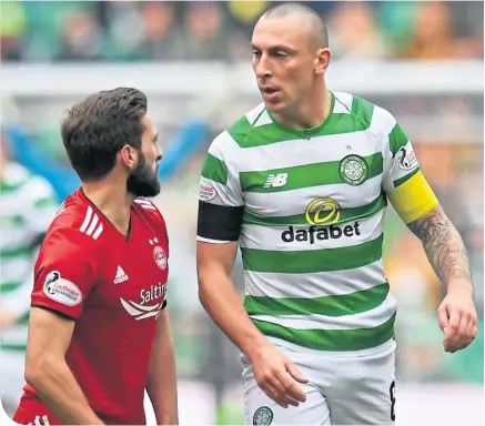  ??  ?? Celtic have been without Scott Brown’s competitiv­e streak, seen here with Aberdeen’s Graeme Shinnie