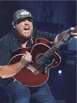  ?? FILE/INVISION/AP ?? Luke Combs performs during CMA Fest 2022 in Nashville, Tenn., on June 11. Comb’s latest album, “Growin’ Up,” came out Friday.