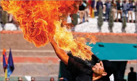  ?? REUTERS ?? A police recruit performs a stunt during a passing out parade in Manigam, east of Srinagar, on Wednesday.