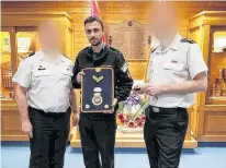  ?? POSTMEDIA NEWS ?? Boris Mihajlovic, centre, has been readmitted into the Canadian Naval Forces despite known involvemen­t with white supremacis­t groups and neo-Nazi forums. Faces are blurred for privacy.