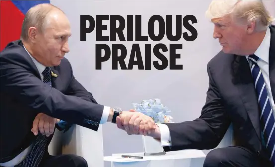  ?? EVAN VUCCI/AP FILES ?? Then-President Donald Trump shakes hands with Russian President Vladimir Putin at the G20 Summit in 2017.