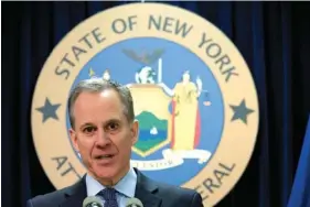  ?? AP PHOTO/MARY ALTAFFER ?? New York Attorney General Eric T. Schneiderm­an speaks during a 2016 news conference in New York.