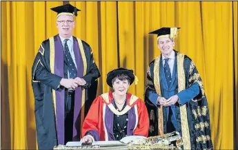  ??  ?? Dame Judith Hackitt was awarded an honorary degree in recognitio­n of her outstandin­g contributi­on to health and safety in engineerin­g and as a role model for inspiring young women in the STEM industry. She is pictured with Vice-Chancellor Professor Robert Allison and Lord Sebastian Coe.