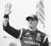  ?? CHARLIE NEIBERGALL AP ?? Josef Newgarden waves to the fans after winning the IndyCar Series race at Iowa Speedway in Newton, Iowa.