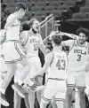  ?? Sarah Stier / Getty Images ?? UCLA is thrilled to move on to the Sweet 16 after barely squeezing into the field as an 11 seed playing in the First Four.