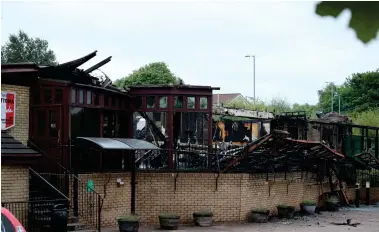  ?? ?? Airdrie institutio­n Trattoria Guidi was gutted by a large fire in August 2021