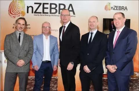  ??  ?? Art McCormack, nZebra; Tomás O’Leary, nZebra; Simon Coveney TD Minister for Housing, Planning, Community and Local Government; Andy Lundberg, nZebra and Paul Kehoe TD.