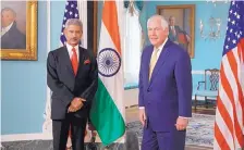  ?? MANUEL BALCE CENETA/ASSOCIATED PRESS ?? Secretary of State Rex Tillerson, with Indian Foreign Secretary Subrahmany­am Jaishankar, listens to a reporter’s question in the Treaty Room at the State Department in Washington on Friday.