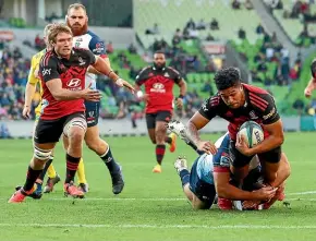  ?? GETTY IMAGES ?? Leicester Fainga’anuku scored a hat-trick of tries for the Crusaders against the Rebels in Perth.