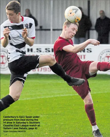  ??  ?? Canterbury’s Gary Sayer under pressure from Deal during the 1-1 draw in Saturday’s Southern Counties East League match at Salters Lane. Details, page 41