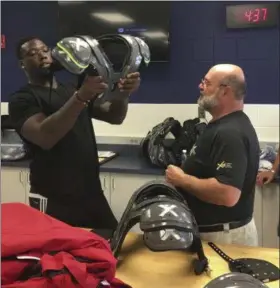  ?? XTECH PROTECTIVE EQUIPMENT VIA ASSOCIATED PRESS ?? A photo provided by XTECH Protective Equipment shows Jason Pierre-Paul of the Giants putting on XTECH pads.