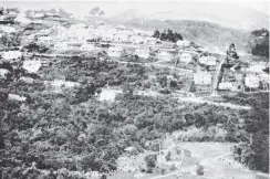  ??  ?? A rising suburb of Dunedin: Dalmore, from Maori Hill, showing a portion of Woodhaugh Gardens in the foreground. — Otago Witness, 23.4.1919