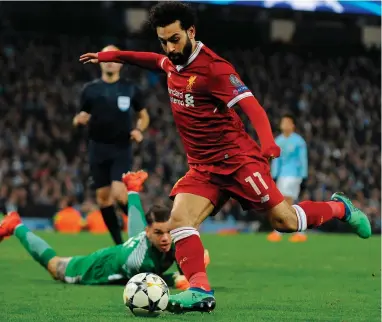  ??  ?? AWARD WINNER: Liverpool will be looking to Football Writers’ Player of the Year Mohamed Salah in their Champions League match against AS Roma tonight.