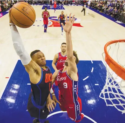  ?? AP FOTO ?? TRIPLE DOUBLE.
Oklahoma City Thunder’s Russell Westbrook (left) pulls off a triple double to power Thunder through a triple overtime thriller. RUSSELL’s HUSTLE 27 POINTS 17 REBOUNDS 15 ASSISTS