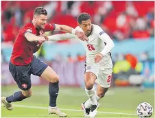  ?? Picture: REUTERS ?? England’s Jude Bellingham in action with Czech Republic’s Ondrej Celustka during their Euro 2020 Group D match yesterday.