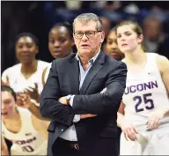  ?? Stephen Dunn / Associated Press ?? UConn coach Geno Auriemma directs his team during the second half against Central Florida on Feb. 22 in Storrs.