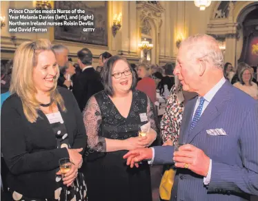  ?? GETTY ?? Prince Charles meets Nurse of the Year Melanie Davies (left), and (right) Northern Ireland nurses Roisin Devlin and David Ferran