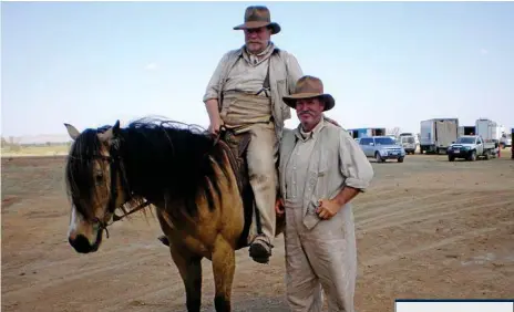  ?? Photo: CONTRIBUTE­D ?? GIDDY UP: Actor Jack Thompson (on horse) takes some tips from Cowboy Up owner and horse riding teacher Peter Gould on the set of Australia.