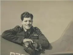  ??  ?? Alastair Gunn on the tail of Spitfire R7056 at RAF Benson (Gunn family)