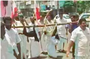  ?? — via web ?? A screen grab of a video showing Youth Front (M) activists parading dead dogs on Tuesday.