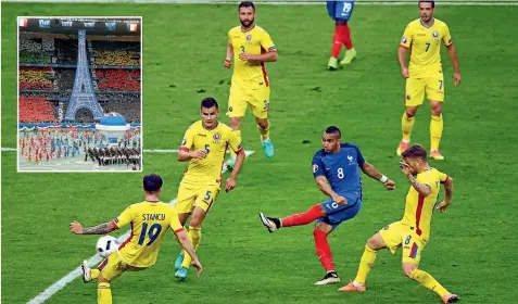  ?? GETTY IMAGES/ REUTERS ?? Dimitri Payet, of France, scores his team’s second goal to set up the hosts’ 2-1 victory over Romania in the opening game of Euro 2016 at Stade de France, which was preceded by a stunning opening ceremony, inset.