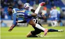  ??  ?? Manchester City’s João Cancelo (right) fouls Brighton’s Danny Welbeck – the Portuguese player was given a red card for the challenge. Photograph: Gareth Fuller/PA