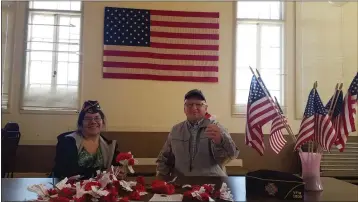  ?? PHOTOS BY CAROLE HESTER ?? Maryann Gonzalez, CAPT DC USN retired and VFW Post 1900Comman­der, enjoys reading some of the thank-you cards to veterans while at the monthly breakfast.