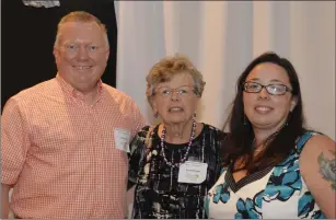  ?? Submitted photos ?? Above, from left, board members, Charles Noel and Nancy Benoit with newly-elected director, Woonsocket City Councilor Melissa Murray. Below, Charles T. Jones holds the Paul Dempster Award, CCA's highest commendati­on.