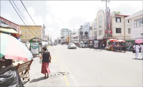  ??  ?? Known for being one of the busiest streets in Central Georgetown, Regent Street was clear yesterday as motorists continued to avoid the new paid parking system. (Photo by Keno George)