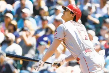  ?? STEPH CHAMBERS GETTY IMAGES ?? Can the Angels’ Shohei Ohtani keep up his torrid pace in the second half, at the plate and on the mound?